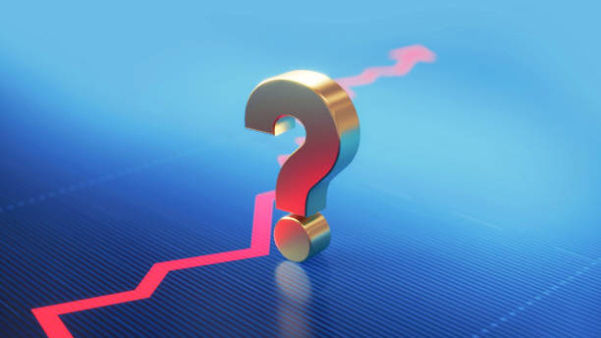 Question mark standing over a financial graph. Selective focus. Horizontal composition with copy space.