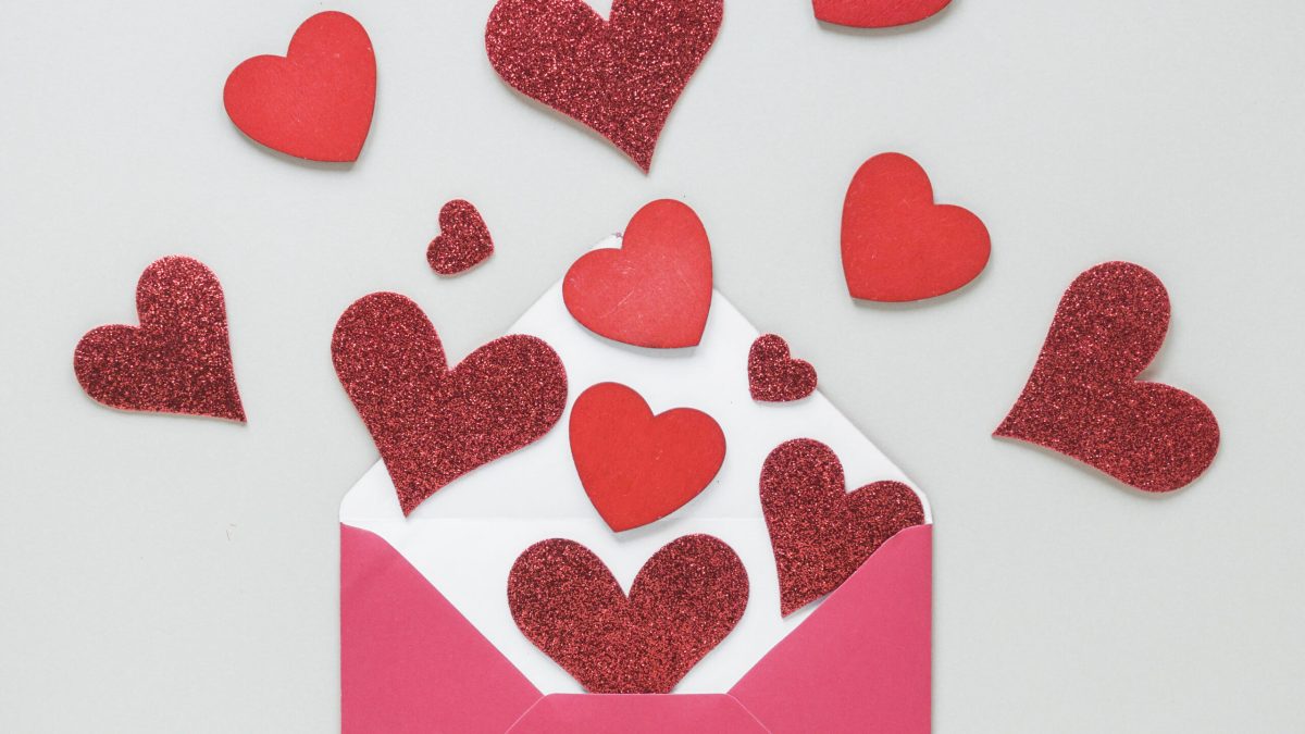 paper-hearts-scattered-from-envelope